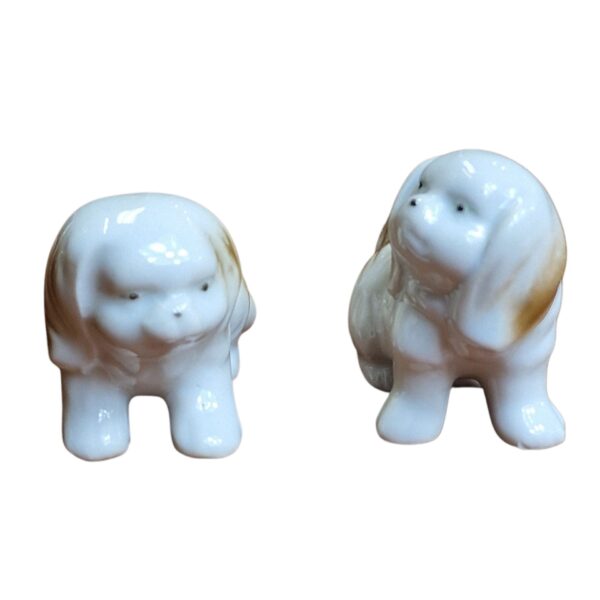 Par de miniaturas de cães em porcelana esmaltada