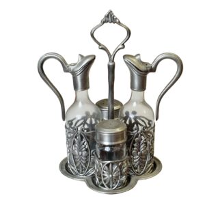 Galheteiro vintage em vidro e metal com decoração floral em relevo